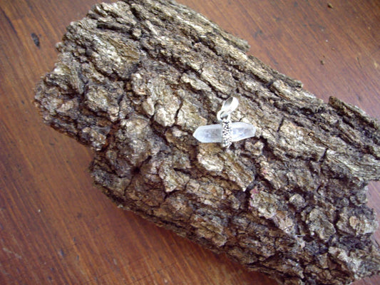 Pendant - Crystal held in a Silver Band